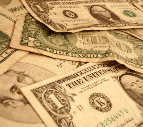 Pawnbroker services. A pile of cash